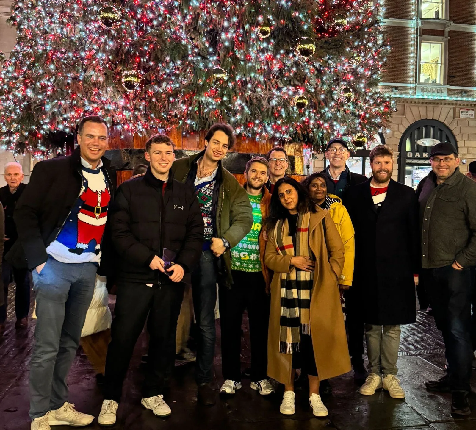 The kennek team in Christmas jumpers in Covent Garden